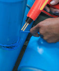 Using 70W Portable Handheld Plastic Welding Kit With 110V US Plug to weld blue plastic pipes, close-up view