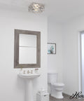 Gablecrest 2-Light Distressed White Flush Mount Ceiling Light, Dimmable, in a bathroom setting.