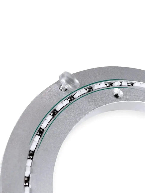 Close-up of the bearing mechanism on Large Lazy Susan Turntable With Silky Smooth Silent Spin Heavy Duty Aluminum Alloy Base.