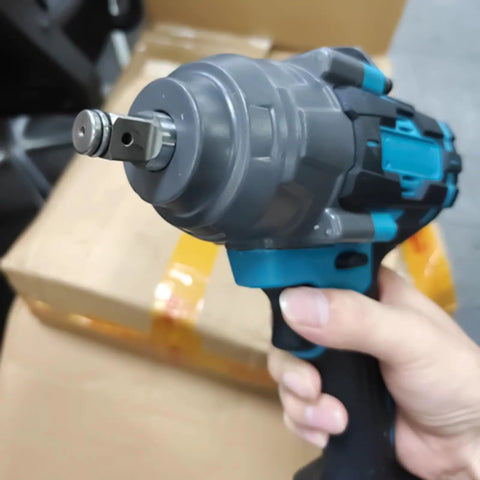 Close-up of Heavy Duty 1000Nm Electric Brushless Shock Torque Wrench For Cars held in hand, showing the drive socket.