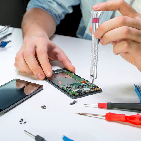 Person using Pro Grade Precision Driver from 500 Pcs Small Replacement Screws Set For Electronics Glasses Watches Laptops And SSD HDD Repair on a device