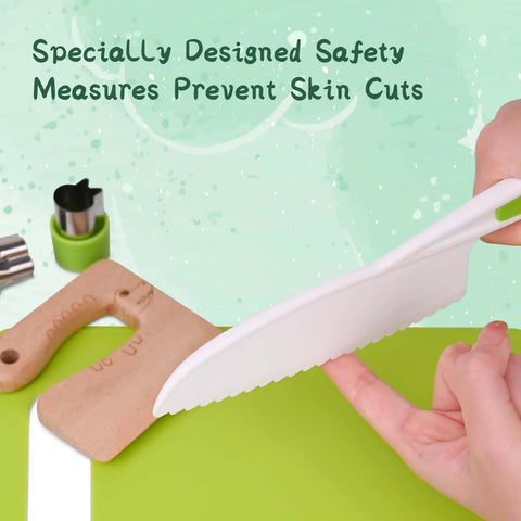 Side view of Kinggrand Montessori kitchen knife with white serrated blade and green handle on a green cutting board