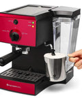 Badass 15 Bar Espresso Machine And Cappuccino Maker With Slick Milk Steamer And Hella Easy 7 Piece Barista Bundle Featuring Quick Grinder And Dual Cups For No Sweat Latte Prep And Knockout Drink Quality Daily In Blue on kitchen counter with frothing pitcher.