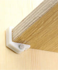 Rose Gold Plastic Shelf Support Clips 30 Pack for Cabinets and Cupboards Partition Plate Fixing Brackets in use on wooden shelf