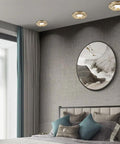 Rock Solid 9 Pack Recessed Lighting Trim Kits Premium Brass Finish Dimmable LED Ceiling Panels in modern bedroom setting.