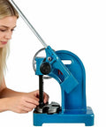 Heavy Duty Cast Iron Arbor Press Machine With Solid Base, 20kN, used for precision stamping tasks with a sturdy design.