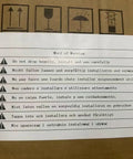 Product warning label in multiple languages for safe installation and handling instructions on package.