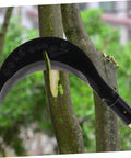 Long Handle Garden Sickle for Weeding and Cultivating Built Tough Manganese Steel Grass Cutter trimming a tree branch