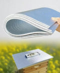 Five Pack Thickened Aluminum Reflective Insulation Film For Beehives Waterproof Moisture Proof Sunshade Cooler Pad shown above beehive