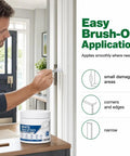 Man applying White Touch Up Paste With Brush Kicks Scratches To The Curb Fast Furniture And Wall Repair Putty on door frame.