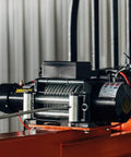 Heavy Duty Fork Mounted Jib Crane With Electric Winch Pivoting Telescopic Boom Extends To 138 Inches Wireless Remote close-up of electric winch.