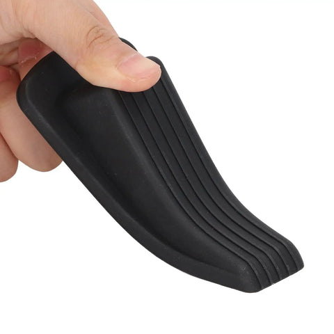 Heavy Duty Door Stop Set 4 Pack Non Slip TPR Grips Windproof And Stackable Door Stoppers held in hand