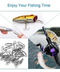 Two Hundred Piece Fishing Power Speed Clips Set With Upgraded Stainless Steel Quick Release Swivels Snap Clips For Lures Ideal For Freshwater And Saltwater Tackle Includes S M L Sizes In Clear Box For Easy Tackle Box Organization, showing usage with various lures and setups.