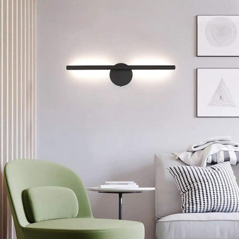 Black Wall Sconce Rotatable 360 Degree LED Light Fixture in living room, stylish hotel corridor wall lamp in warm white 3000K for ambience.