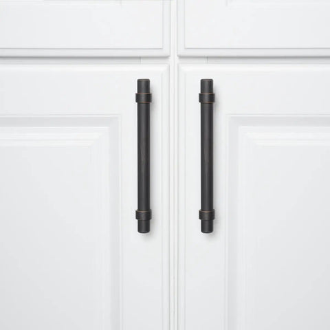 Oil Rubbed Bronze Straight Bar Cabinet Pull 6.63 Inch Length, 5 Inch Hole Center, 1.32 Inch Projection on white cabinets