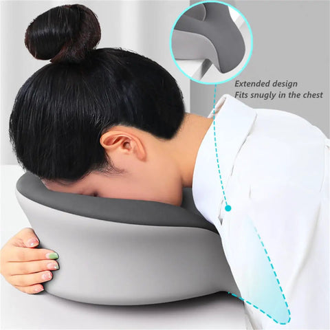 Woman using Ergonomic Charcoal Memory Foam Chest Support Pillow For Naps And Sleep On The Go in resting position