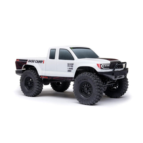 White SCX24 Base Camp 4x4 Rock Crawler Ready To Run RC Truck Brushed with Spektrum Radio, shown on white background.