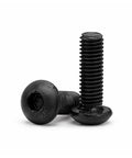Heavy Duty ZENFORX M7x1.0 Button Head Socket Bolts Made From Tough Black Carbon Steel For Serious Heavy Load Industrial Jobs With Smooth Assembly And Top Rated Hardness. Close-up of two bolts showing 12.9 grade.