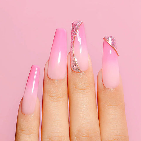 Hand with pink gradient nails using Soak Off UV LED Hema Free Nude Gel Nail Polish Set 4x10ml Natural Sheer Pink Colors Long Lasting 28 Plus Days Easy