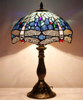 Tiffany Style Dragonfly Blue Stained Glass Table Lamp For Desk And Bedside Reading Light With Antique Green Bronze Base Delivers A Cozy Vibe And Soft Warm Glow For Living Room Bedroom Or Home Office Decor.