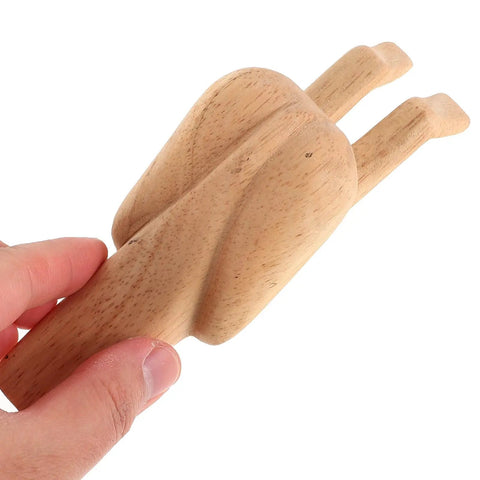 Hand holding a Wooden Door Stopper With Cute Decorative Funny Shape Prevents Doors From Hitting Walls Easy To Install No Tools Needed For Home