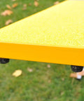 Beefy Durable Aluminum And Steel Dog Teeter Board with yellow rubber skin and black ends, 12-inch wide surface for agility training.