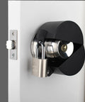 Built Tough Door Knob Lockout Cover Keeps Spaces Locked Down With Zero Drama Blocks knob turning with padlock on door.