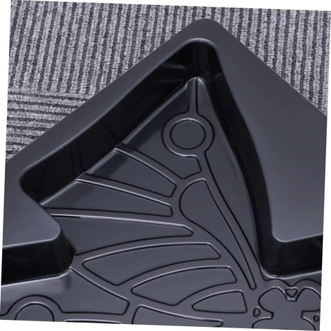 Close-up of black DIY Concrete Paving Mold for Garden Paths and Patios with butterfly pattern, reusable and weatherproof.