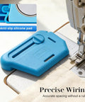 Magnetic Seam Guide For Sewing Machine 3 In 1 With Built In Scale And Seam Ripper next to presser foot on sewing machine.
