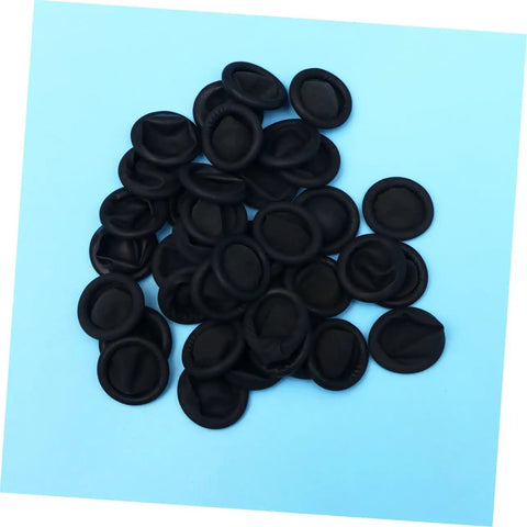 1000 Pack Antistatic Finger Cots Providing A No Sweat Grip That Shields Precise Electronics During Heavy Mechanic Work And Warehouse Tasks While Delivering Knockout Quality On A Tight Budget, black latex covers displayed on blue background.