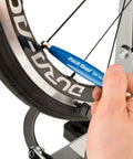 Spoke Wrench For Shimano Wheel Systems SW14.5 3.75mm 4.4mm Blue Pro Grade Bike Repair Tool in use on a bicycle wheel