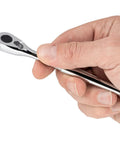 Close-up of hand holding One Quarter Inch Drive Four And One Half Inch Bit Ratchet With Low Profile Access for tight spaces, showing chrome finish.
