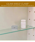 Heavy Duty Glass Shelf Clips Set For Shower Doors Mirrors Closets And Floating Shelves displayed on glass shelf