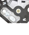Brake vacuum pump mounting plate, black with silver metal bracket and gold mesh insert.