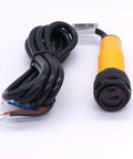 Photoelectric Sensor Adjustable 30 Cm Sensing Range M18 Diffuse Reflection Proximity Switch lying on surface