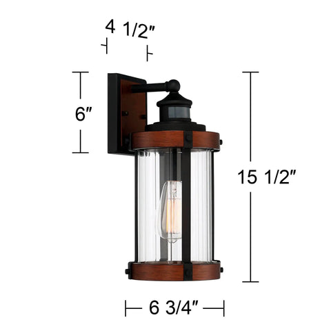 Rock Solid Black Motion Sensor Outdoor Wall Sconce With Zero Fuss Industrial Craftsmanship And Reliable Nighttime Security Lighting For Front Porch Or Driveway, showing dimensions 15.5in height, clear glass and metal design.