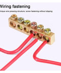 Top Shelf One Pack Golden Wire Screw Connector Terminal Block With Snug Six By Nine Crimp Holes For Heavy Duty Electrical Wiring And No Fuss Quick Connect Installations, showing crimp holes and red wires.