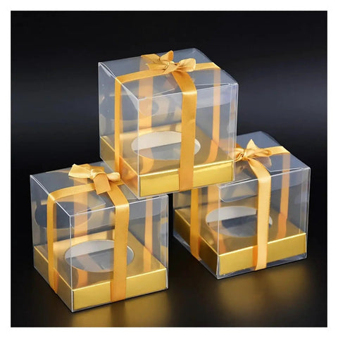 Golden Cake Gift Boxes 30 Pack With Clear Viewing Windows stacked with golden ribbons for premium dessert presentation