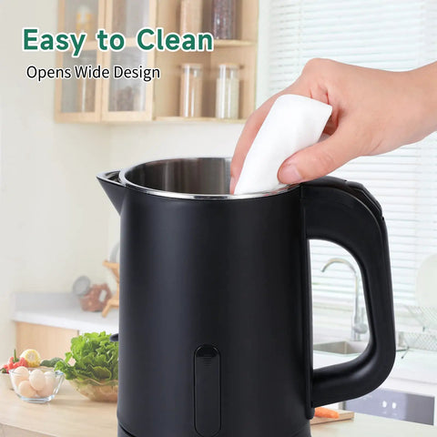 Hand cleaning inside Portable Stainless Steel Electric Kettle 0.8L Mini Hot Water Boiler For Travel, Fast 5 Minute Boil, 600W, Auto Shut Off, Boil Dry Protection, Easy Pour, Black