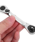 Heavy Duty Mini Ratchet Wrench 2 Pc Double Ended Socket Set Featuring A Smooth 72 Tooth Quick Release Drive and Compact Short Handle held in hand.