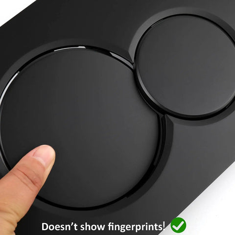 Close-up of Jet Black Gloss Dual Flush Actuator Plate for Concealed Cisterns, wall mount push button showing fingerprint resistance