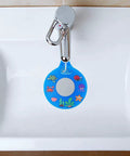 Slick Silicone Bathtub Drain Stopper shown in a bathtub, featuring vibrant ocean-themed designs, BPA free material.