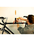 Man using Magnetic Stud Finder Thats Easy To Use No Batteries Made In The USA Powerful Magnet Locates Drywall Studs Fast for DIY bike mount