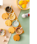 Top Shelf Ceramic Coffee Storage Jar With Secure Wooden Lid And Airtight Design Keeps Daily Grind Sugar Salt Tea Fresh As Ever While Looking Slick On Any Modern Counter Space with spice jars.
