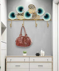 Heavy Duty Wall Mounted Coat Rack For Front Door Entryway Hand Welded Steel Hooks For Hallway Living Room Space Saver Style, holding a red bag.