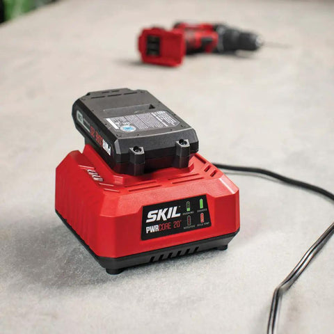 20V Standard Charger For PWR Core 20 Batteries With Fast One Hour Charge And Clear LED Status Indicator on workbench.