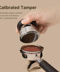 Ultimate Espresso Tamper Set For 58.4Mm Portafilters With Self Leveling Weight showing a calibrated tamper applying pressure on coffee grounds.