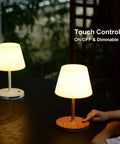 Cordless USB Rechargeable Table Lamp With 4000mAh Battery, 2700K Warm LED, touch dimmable, on a patio dining table