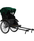 Retro Alloy Rickshaw Model Miniature Decor Showcasing Legit Vintage Charm And Dope Zinc Construction Perfect For Adding Cool Shelf Appeal Or Making A Solid Nostalgic Display Accent In Black - angled view with green canopy.
