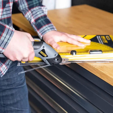 Person using Cordless Electric Craft Scissors With Two Blades And Charger One Button Operation No Fuss for cutting materials
